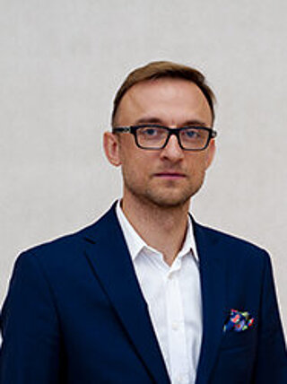 Zdjęcie portretowe Łukasza Machniaka